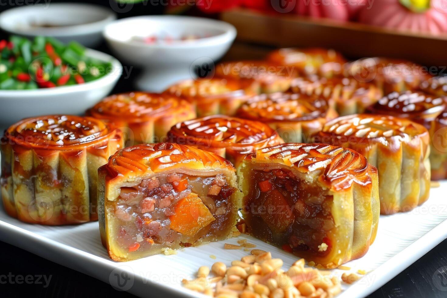 Vietnamese mooncakes symbolize artisanal craftsmanship, authenticity, and tradition. These sweet treats with diverse flavors and intricate designs are a representation of cultural heritage photo