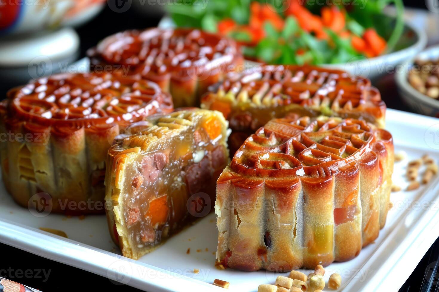Mooncakes, a traditional Vietnamese delicacy, are popular during the MidAutumn Festival. They come in intricate designs and fillings like lotus seed, red bean, and salted egg yolk photo