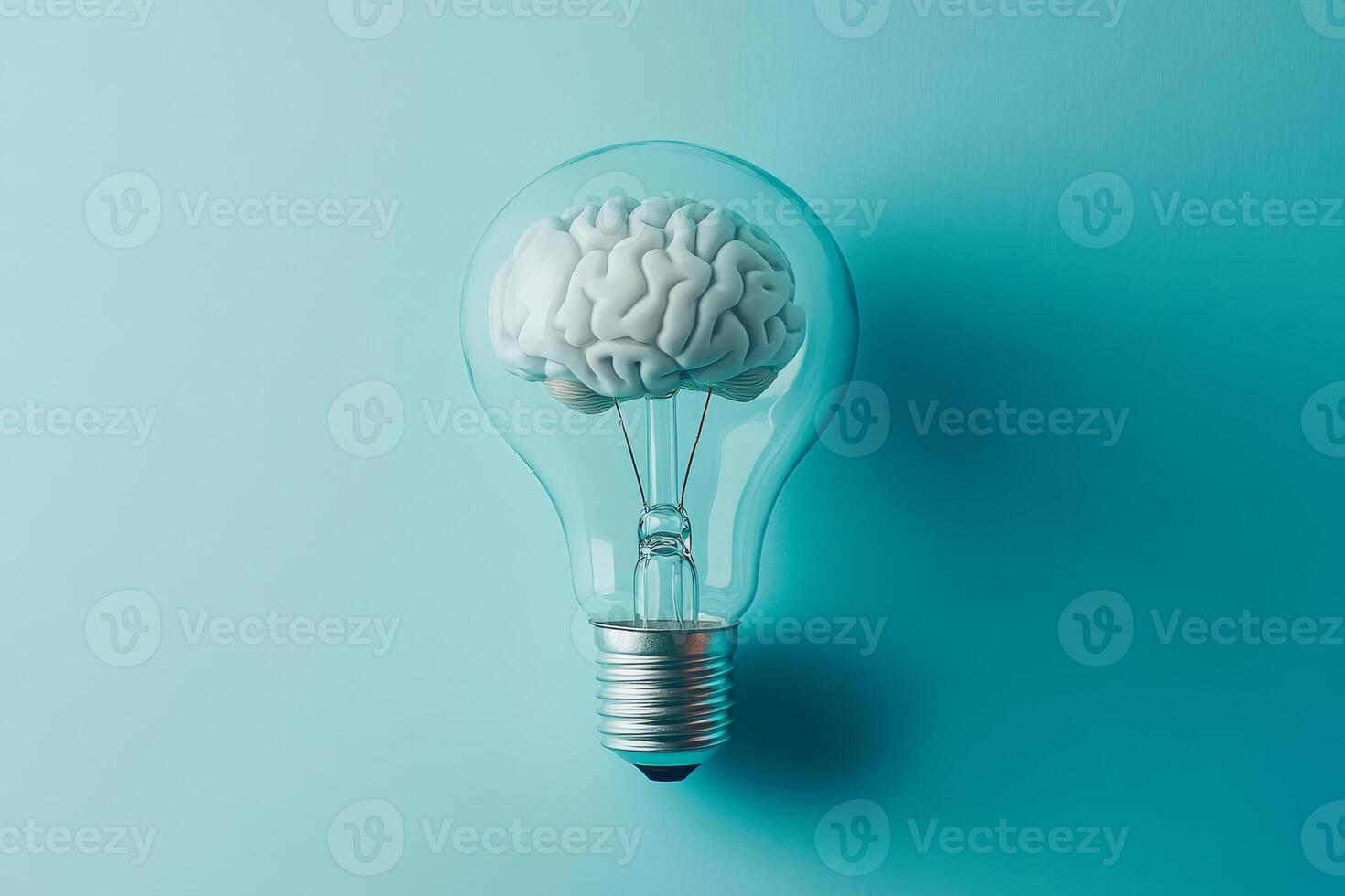 A striking image of a human brain inside a glowing light bulb symbolizes the continuous generation of innovative ideas and inspiration that guides us toward creativity and progress photo