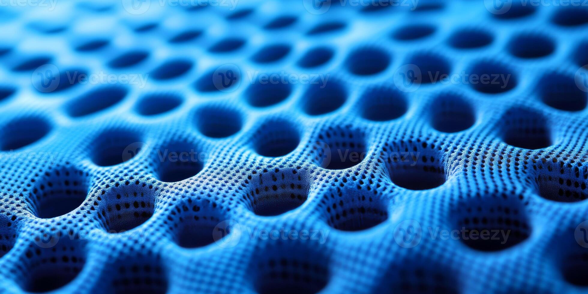 Explore the stunning and vibrant blue fabric texture that is perfect for crafting sports jerseys. Its distinctive and unique pattern makes it exceptionally suitable for highperformance athletic wear photo