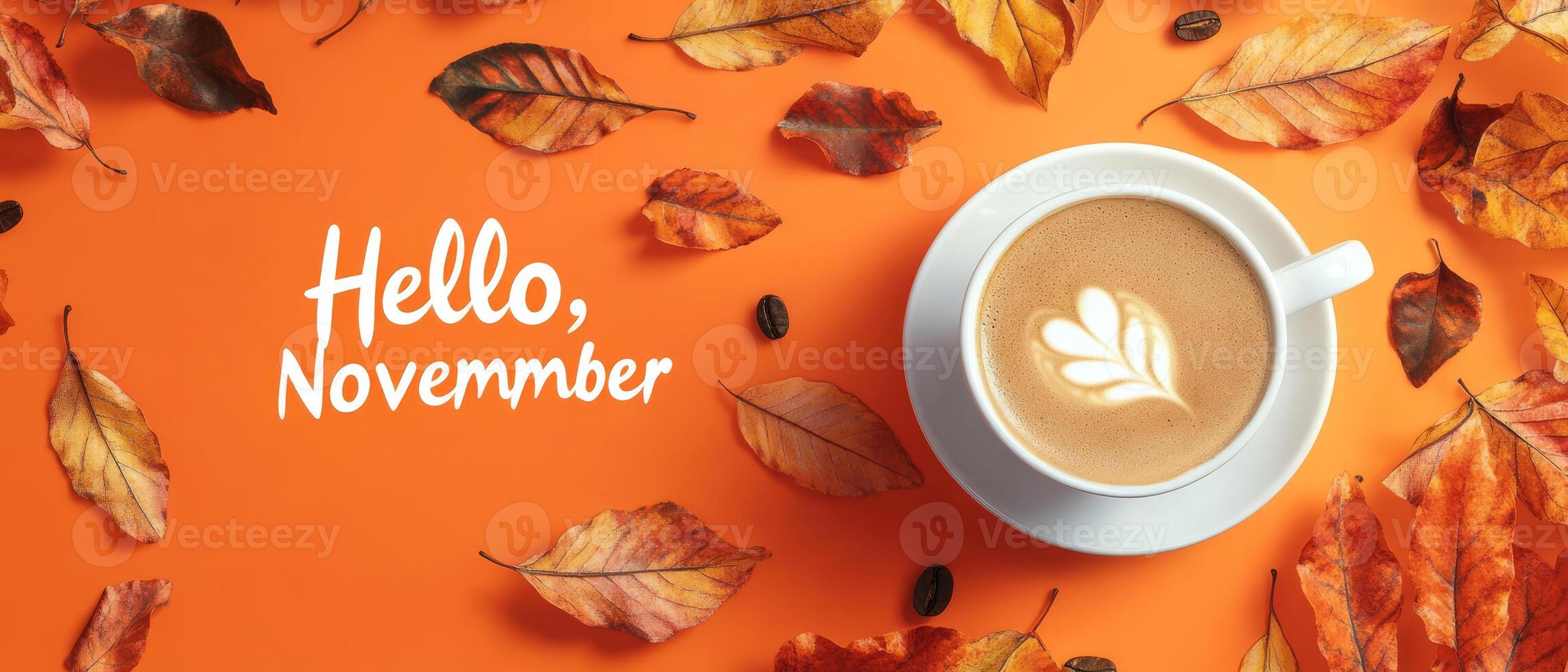Embrace the beauty of November with a warm cup of delicious coffee as you sit among the vibrant hues of autumn leaves, creating the perfect atmosphere for cozy moments and deep seasonal reflections photo