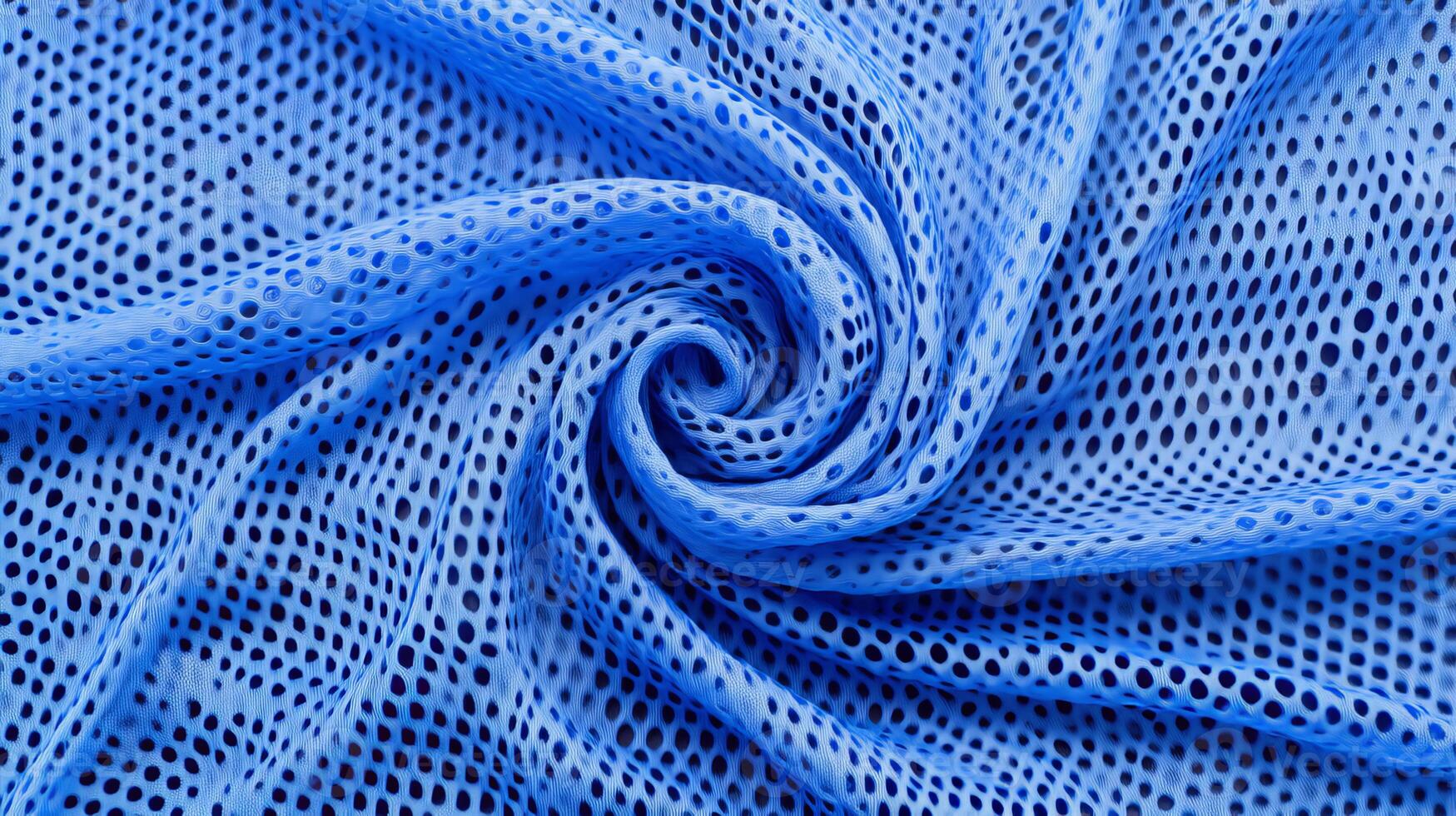 This closeup highlights the unique blue mesh fabric designed for sports jerseys, showcasing its breathable and lightweight properties, making it ideal for athletic wear and uniforms photo
