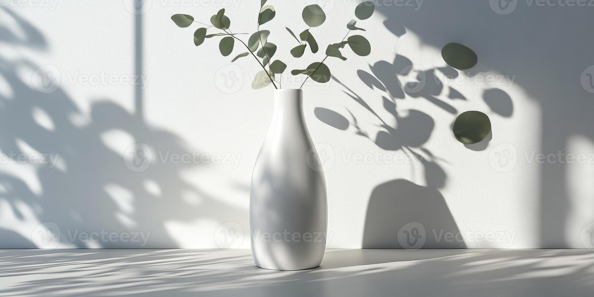 A minimalist white vase filled with vibrant greenery casts soft shadows on a neutral backdrop, showcasing natures simplicity and inherent beauty in an artistic, visually appealing way photo
