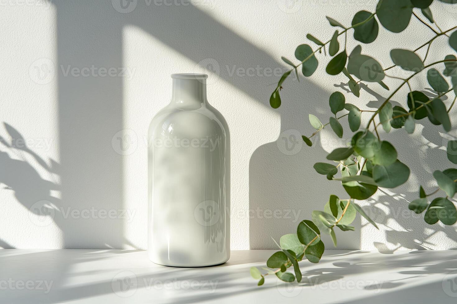 A serene display features a delicate white vase casting soft shadows, complemented by vibrant greenery against a neutral backdrop, embodying modern aesthetics and sustainability in design photo