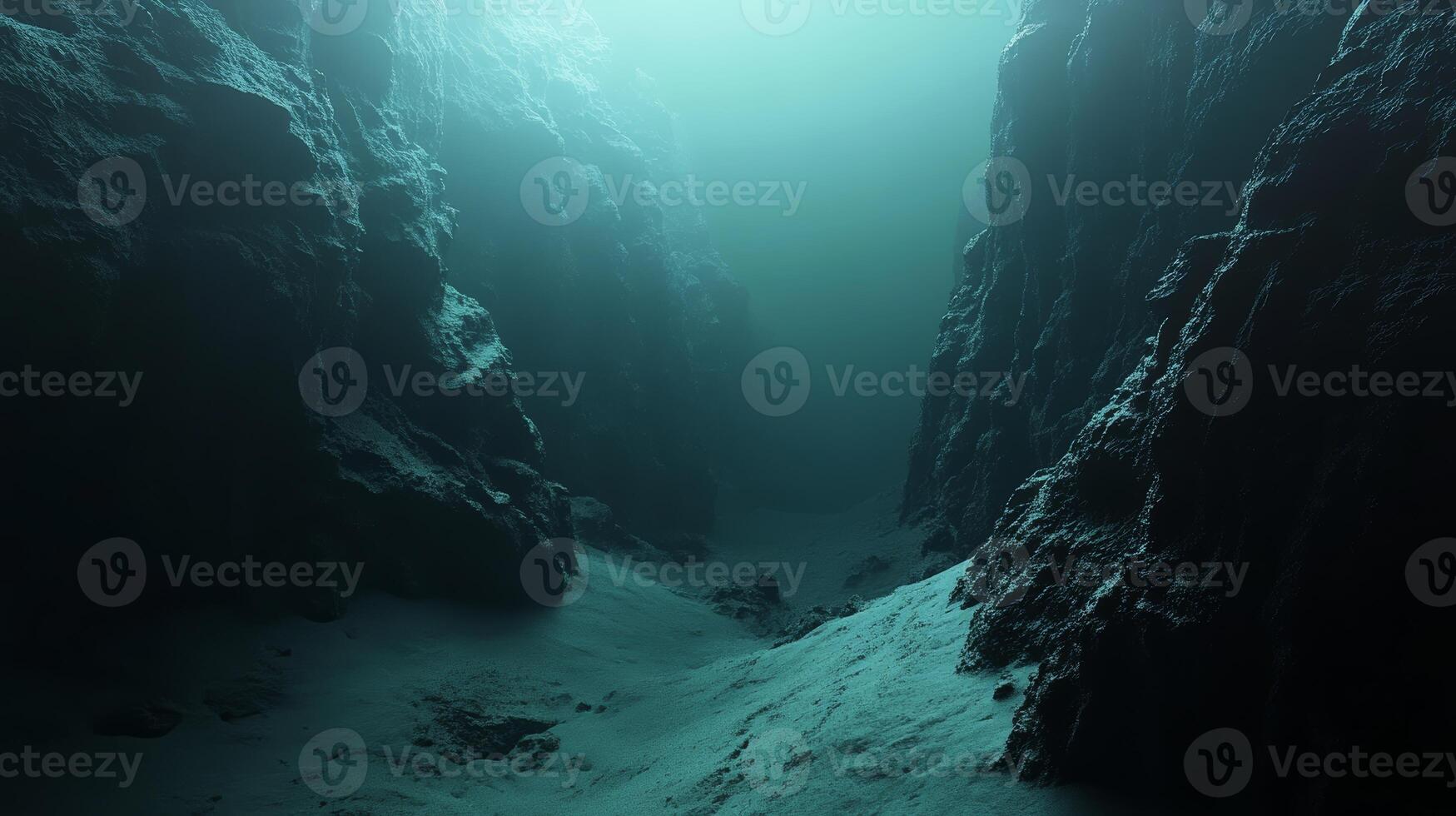 A beautifully serene view showcasing an underwater canyon that is illuminated by soft bluegreen light photo