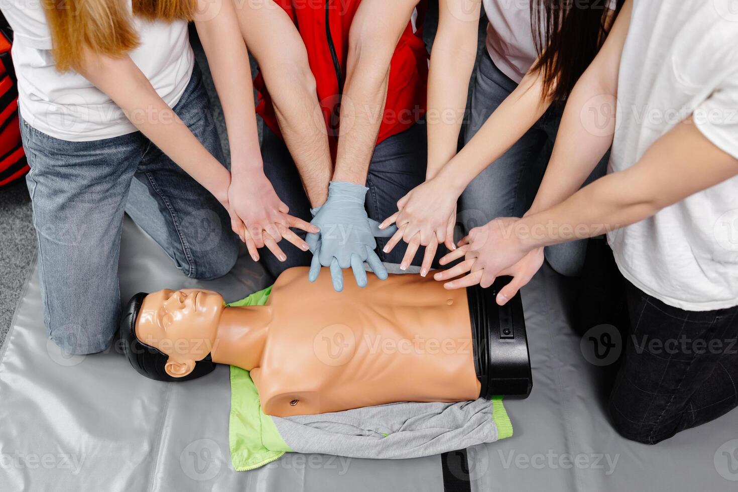 First Aid Training - Cardiopulmonary resuscitation. First aid course on cpr dummy. photo