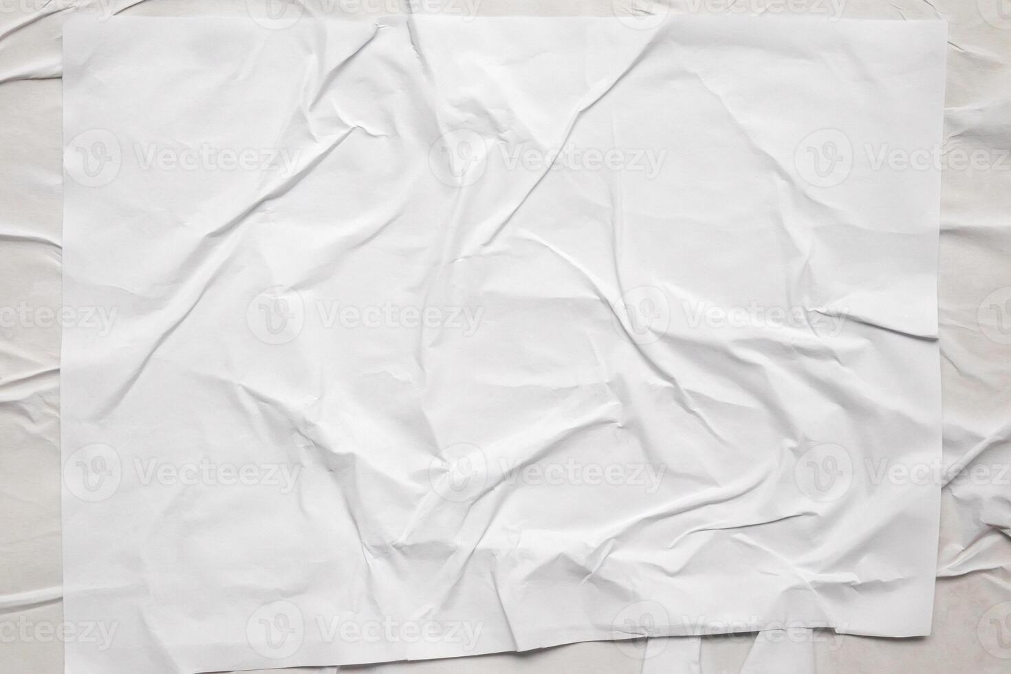 white crumpled and creased glued wrinkled paper poster texture background photo