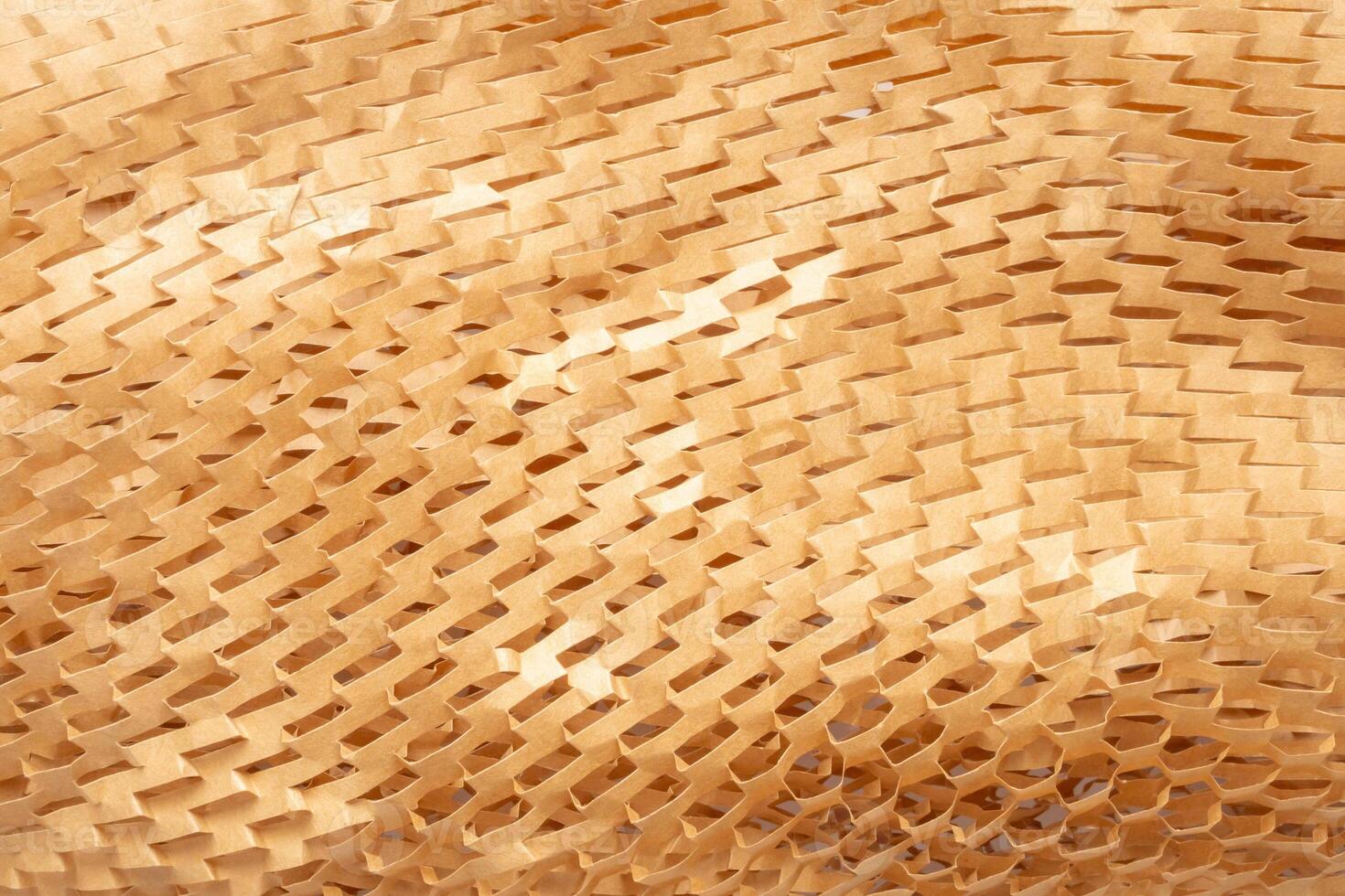 Eco friendly brown paper honeycomb texture wrap background for product packaging parcel carton box photo
