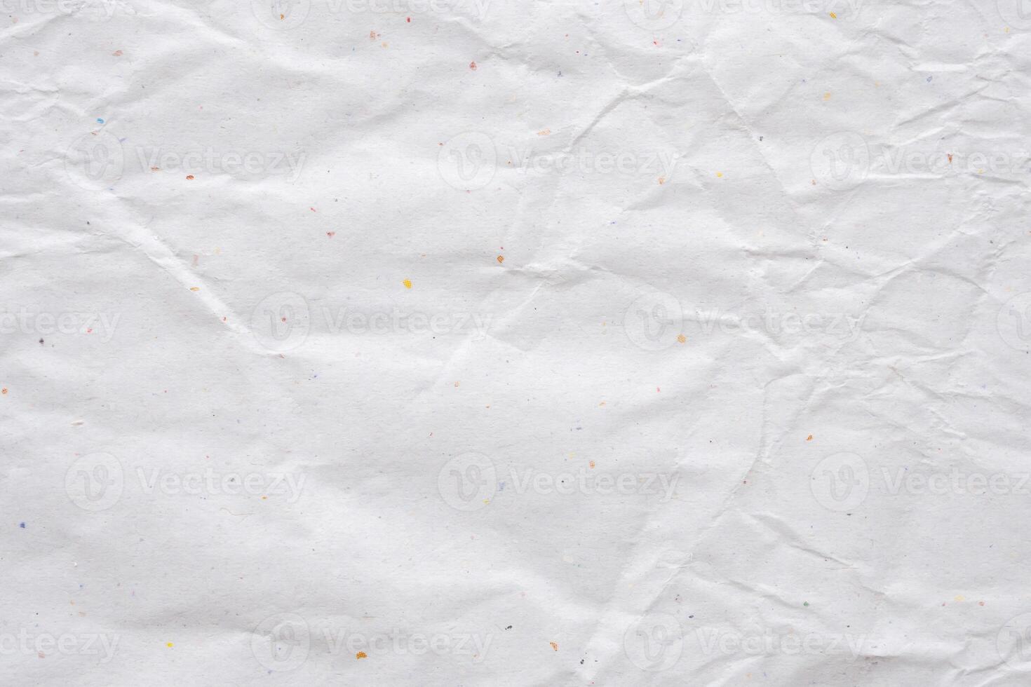 white crumpled and creased recycle paper texture background photo