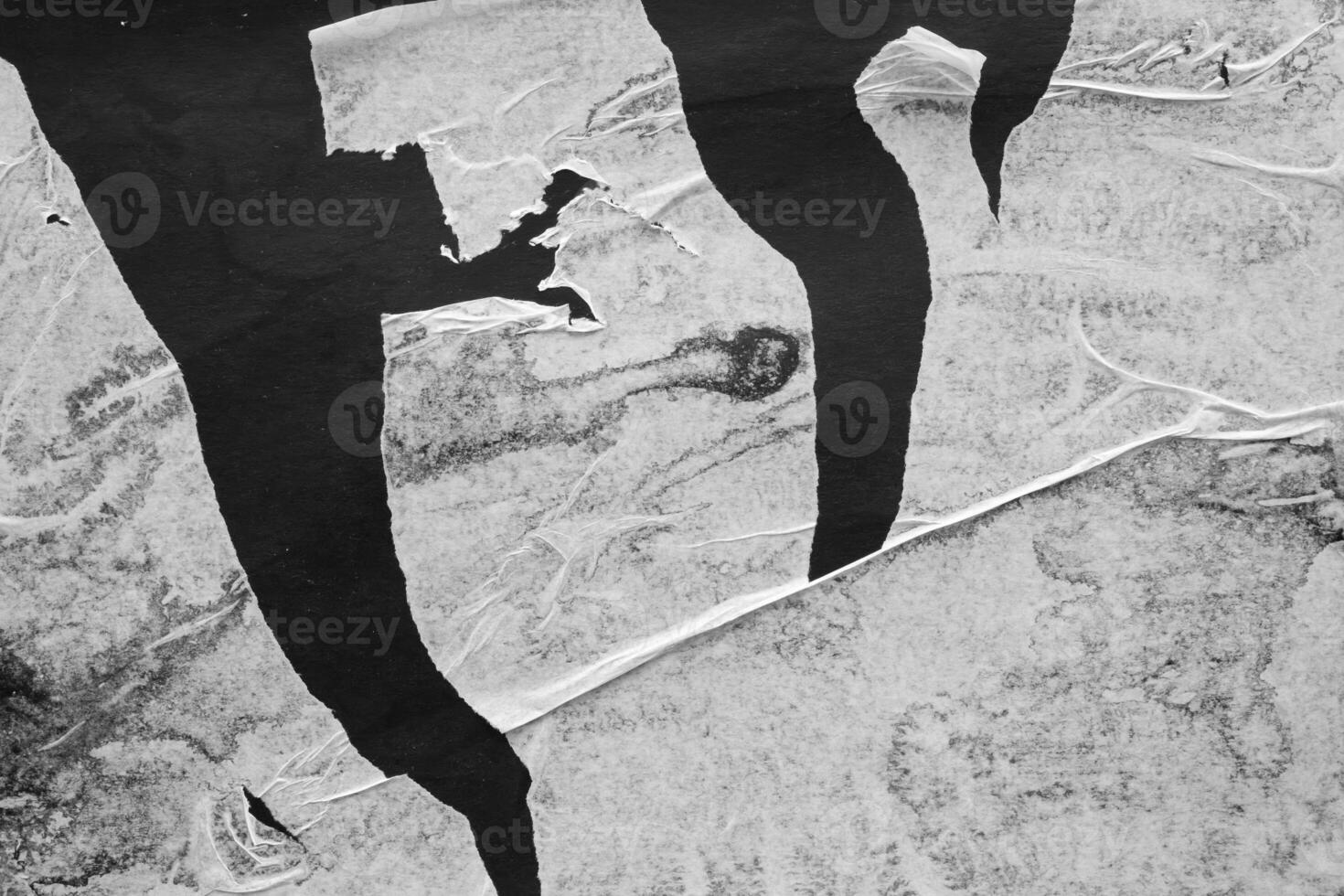 Old grunge ripped torn black paper poster surface texture background photo