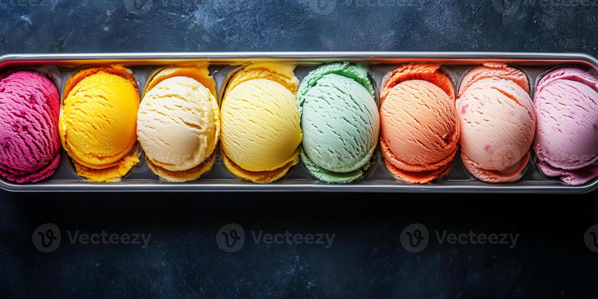 Striped gelato scoops showing technique of layering flavors in container photo
