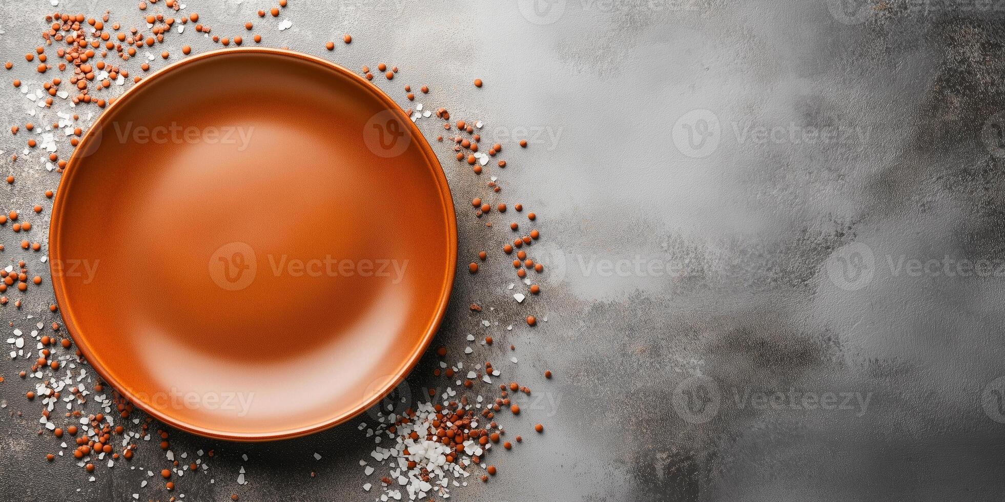 Sea salt caramel confections used to create a border around empty plate photo