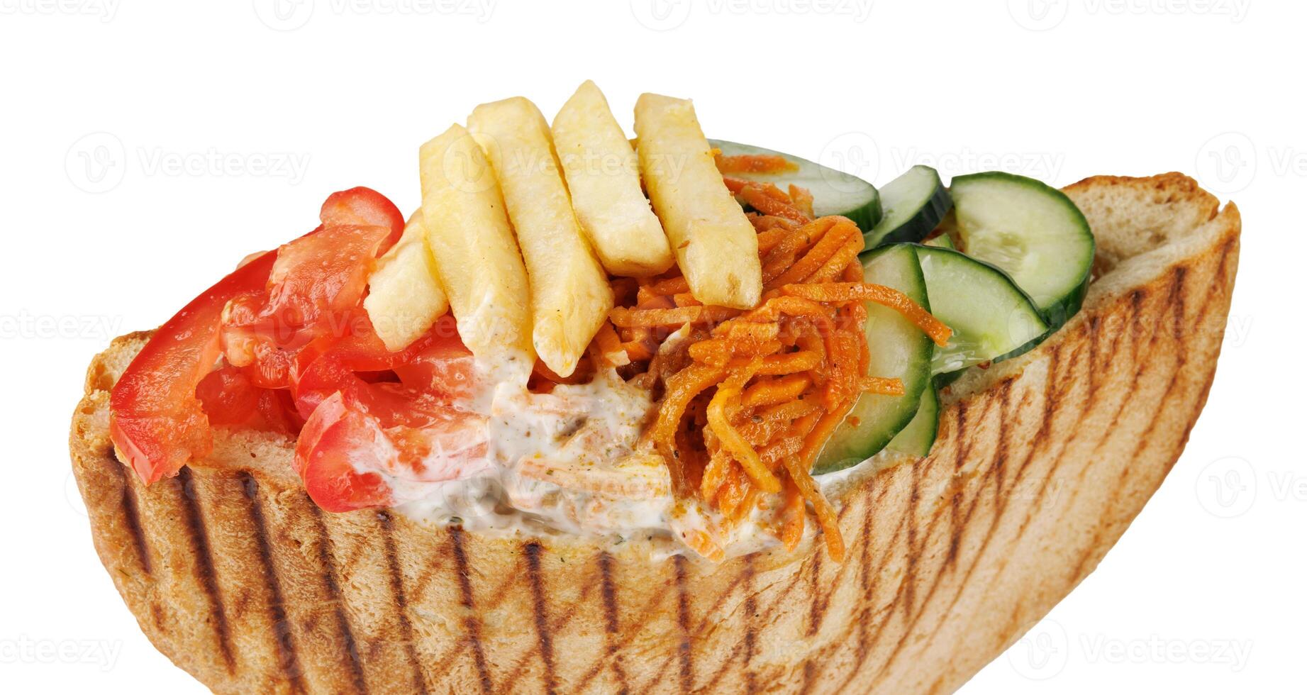 Doner with a crispy crust and tasty filling with sauce on a white background. photo