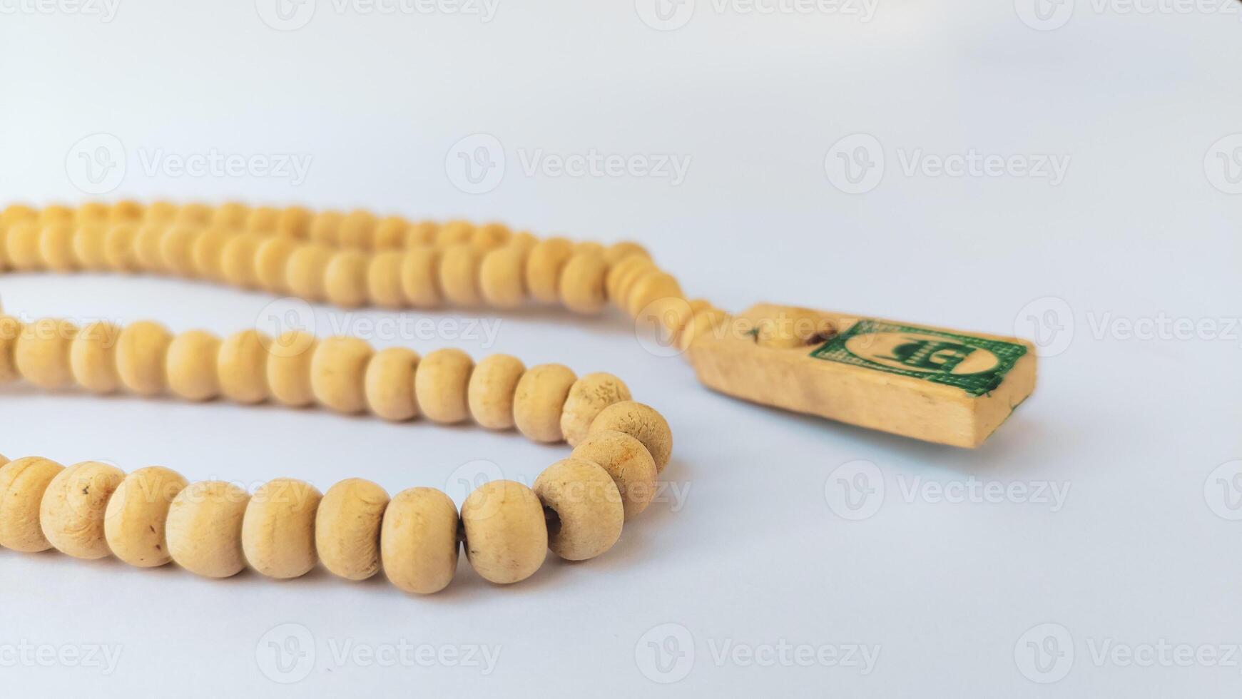 holy , tasbih. for moslem isolated on white background photo