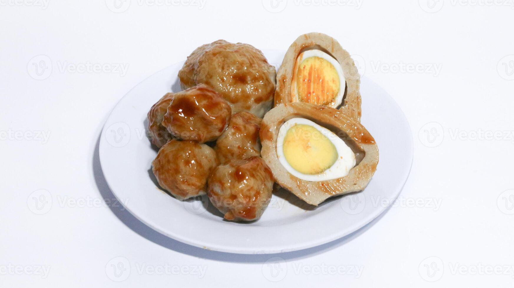 Pentol is a typical Indonesian spicy snack made from beef and tapioca flour. photo