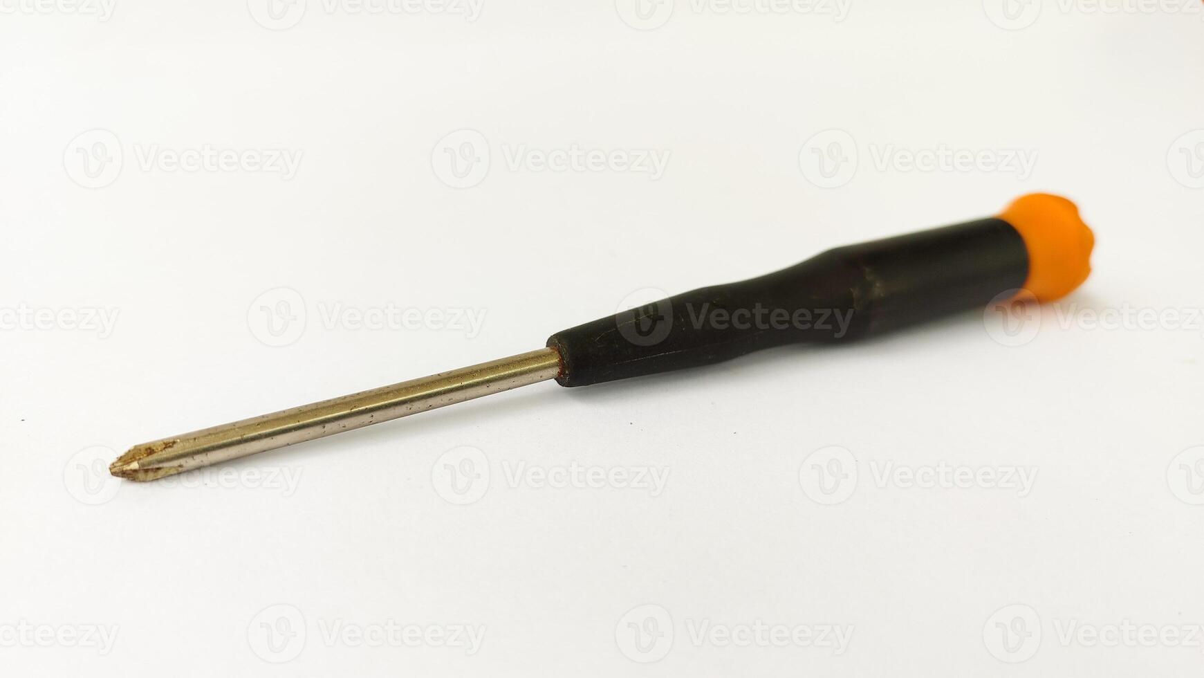 Set of red-orange-blue screwdrivers isolated on white background. Builder's and electrician's tools. Equipment. Set of steel screwdriver bits with red and black plastic handles. photo