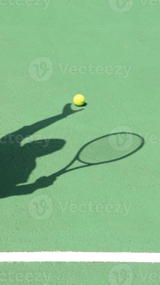 Tennis ball on blue tennis court. the concept of a sporty lifestyle. photo