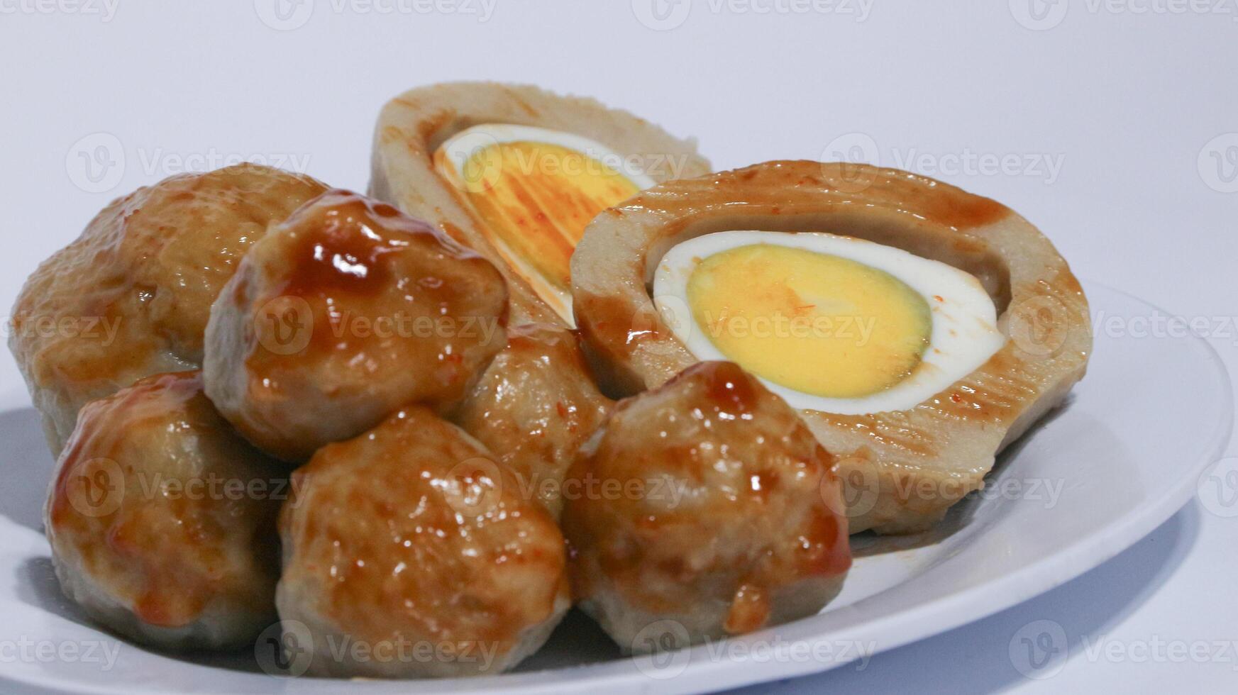 Pentol is a typical Indonesian spicy snack made from beef and tapioca flour. photo