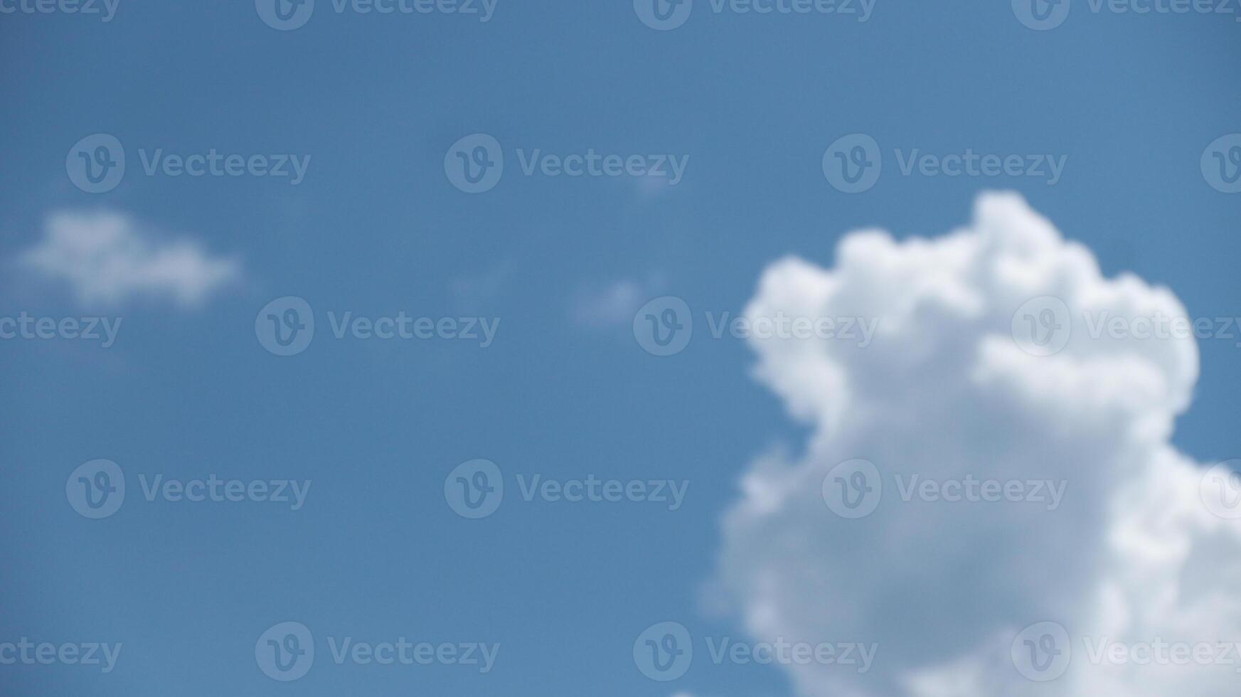 Aerial view of fluffy clouds and blue sky over the city photo