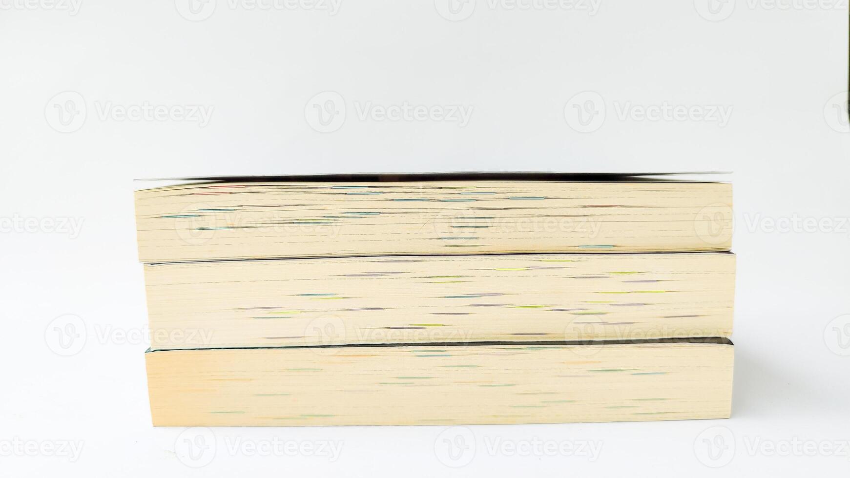 stack of colorful books on white background, open book, stack of books isolated on background, education, read, study, school, library, dictionary. photo