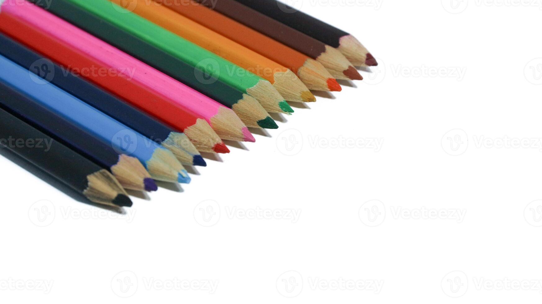 Color pencils isolated on white background photo