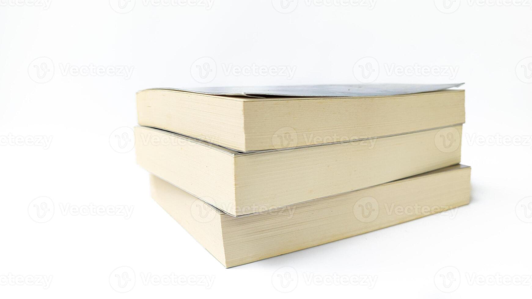 stack of colorful books on white background, open book, stack of books isolated on background, education, read, study, school, library, dictionary. photo