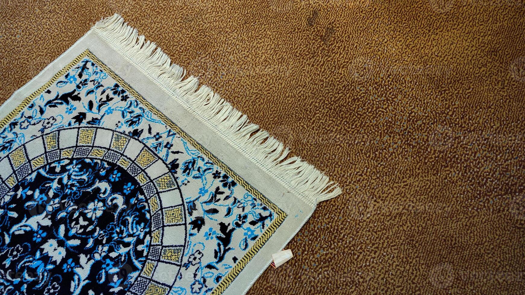 Sajadah. The prayer mat is used as a base when praying the Muslims. photo