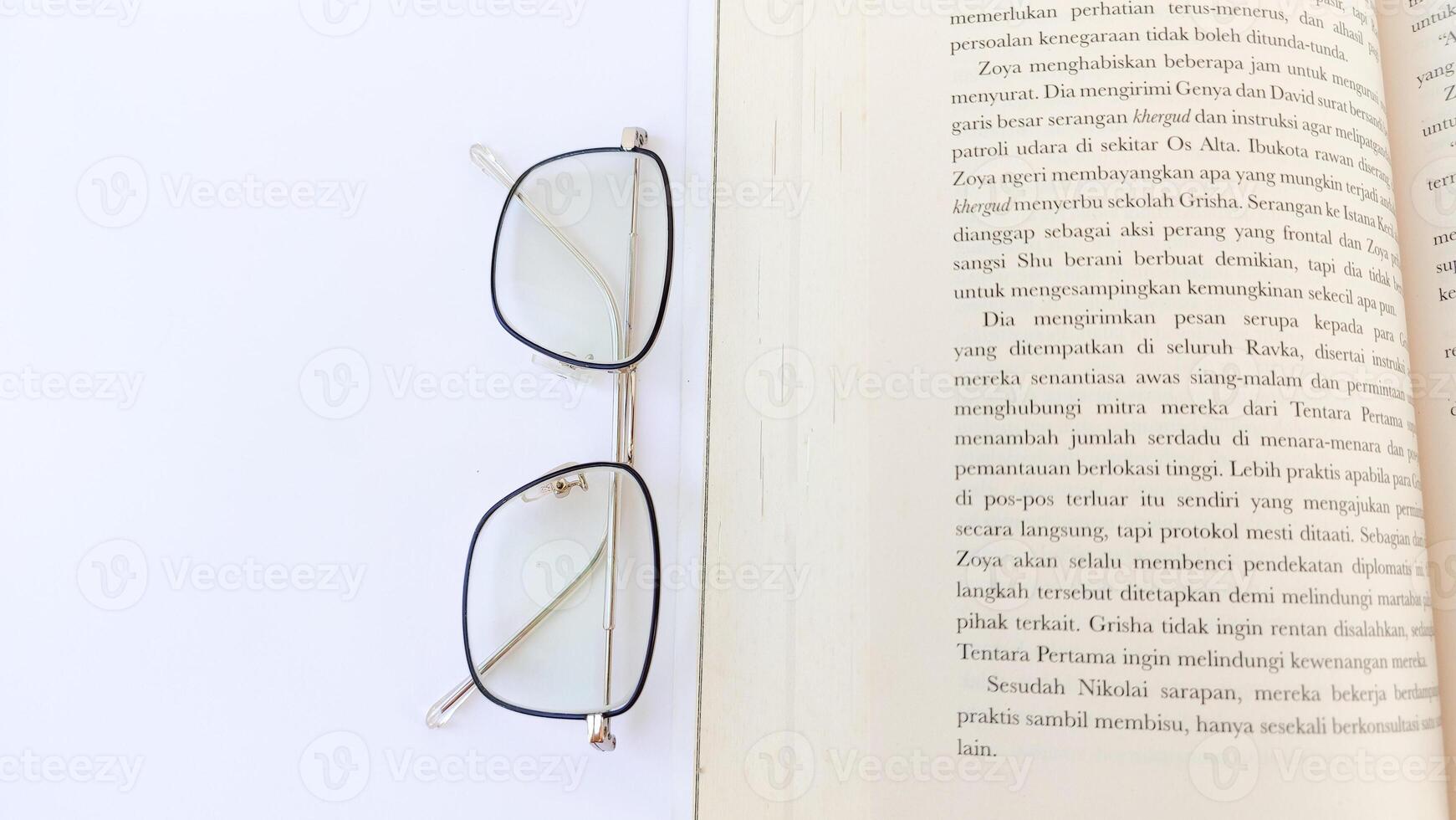 stack of colorful books on white background, open book, stack of books isolated on background, education, read, study, school, library, dictionary. photo