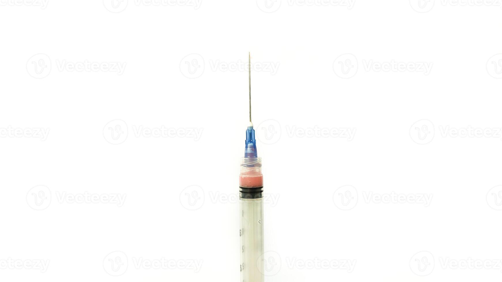 Vial of Drug or Vaccine and 3 ml Plastic Syringe with Needle Isolated on the White Background, blue tone color photo