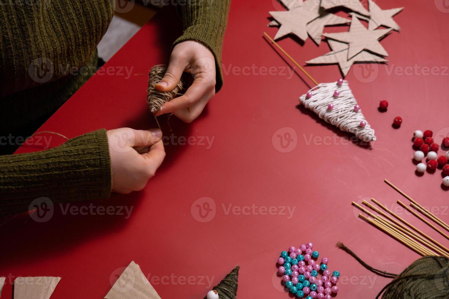 Rope Christmas trees Storytelling creating craft Christmas holiday present. Tactile hand-on activity. Master class progress of creative me-made gifts. Seasonal domestic life micro moment hobby. Sustainable living photo