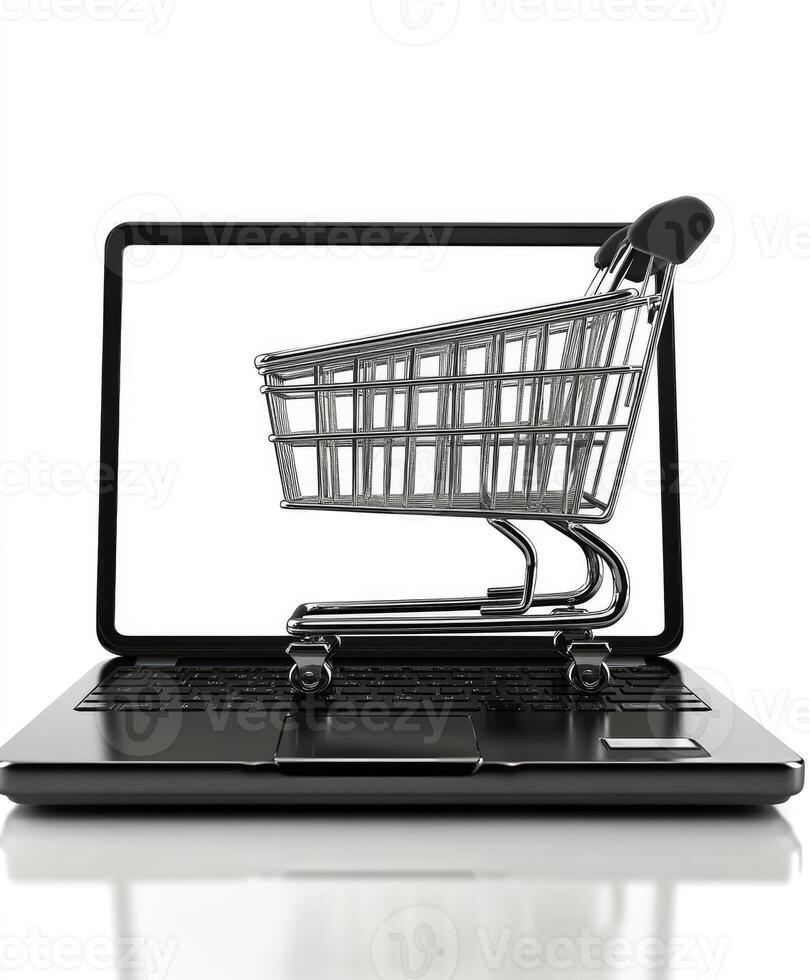 Shopping cart coming out of laptop screen suggesting online shopping photo