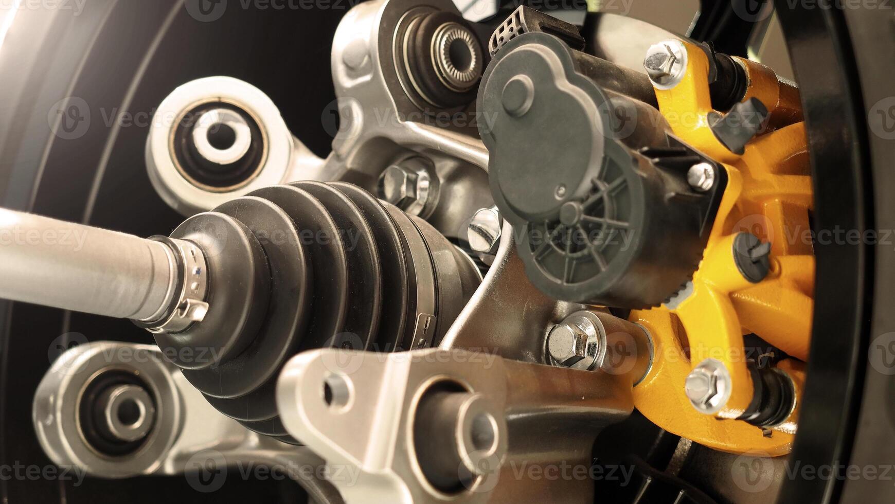 Car suspension and drive shaft. Structure of EV car spare parts. Such as Front or Rear suspension Shock absorber suspension Brake. Elements of the suspension and Chassis structure. Car service repair. photo