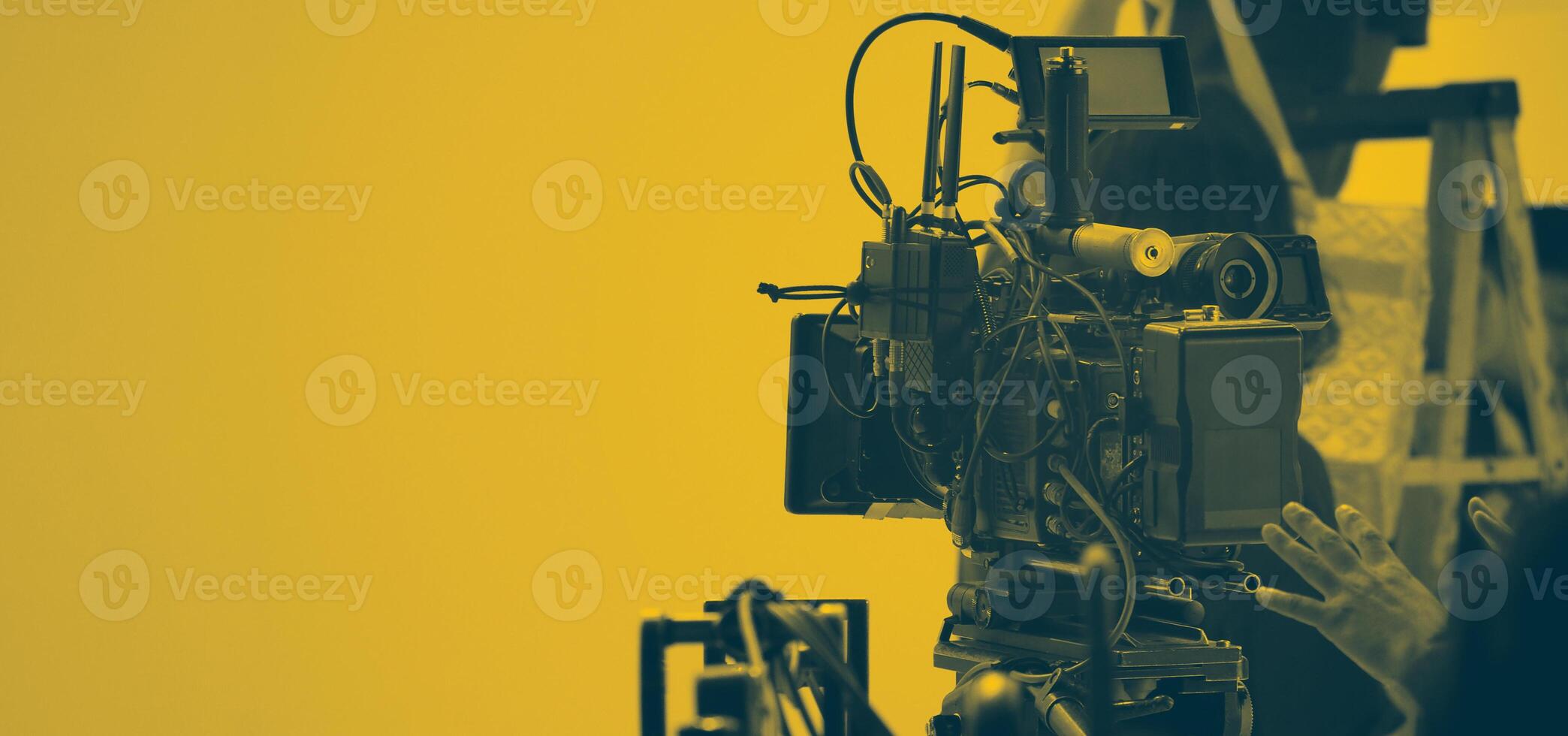 Film director and crew making commercial content advertising in studio. photo