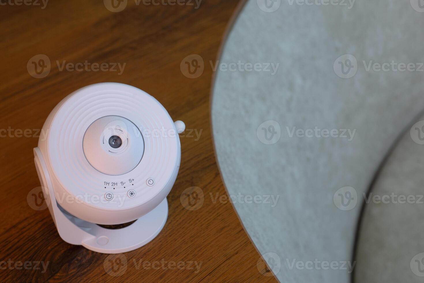 Galaxy projector for studying solar system at home, learning at home using special projector to project planets and stars on ceiling of room, device for displaying galaxy at home photo
