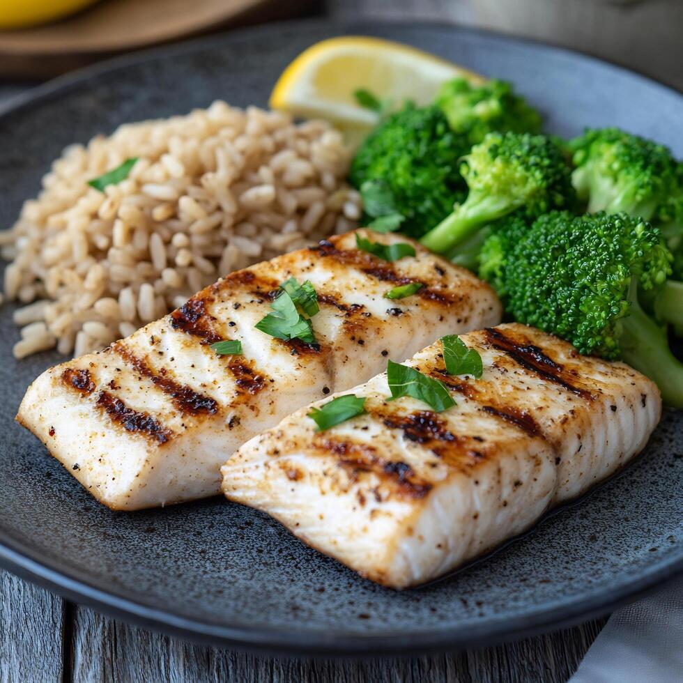 Grilled salmon with lemon and garlic photo