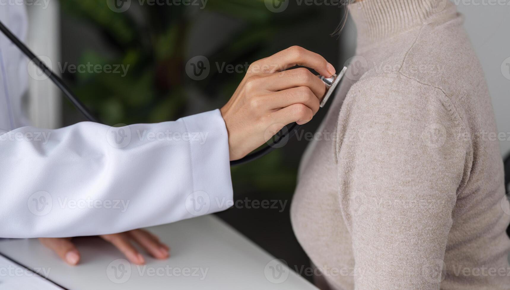 Doctor and Patient Consultation in Modern Clinic Setting for Health Examination and Medical Advice photo
