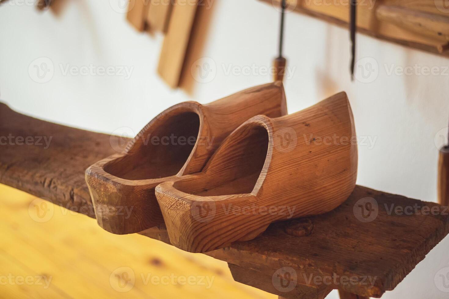 Clogs - A pair of vintage wooden shoes photo