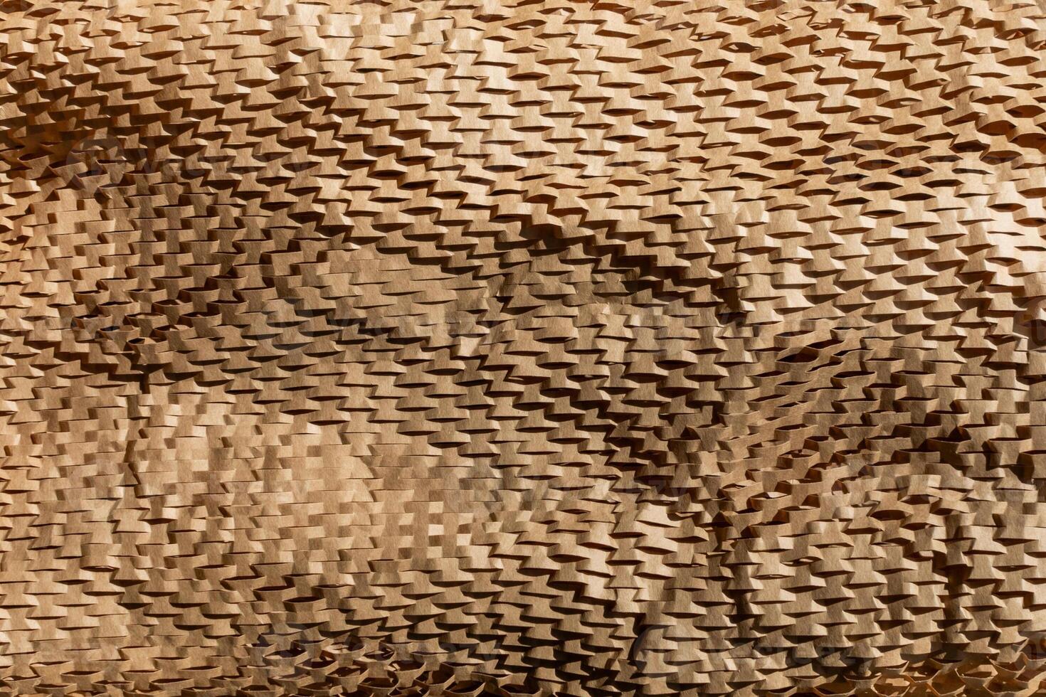 Textured close up of protective eco friendly cardboard packaging material, emphasizing sustainability and recycling concepts photo
