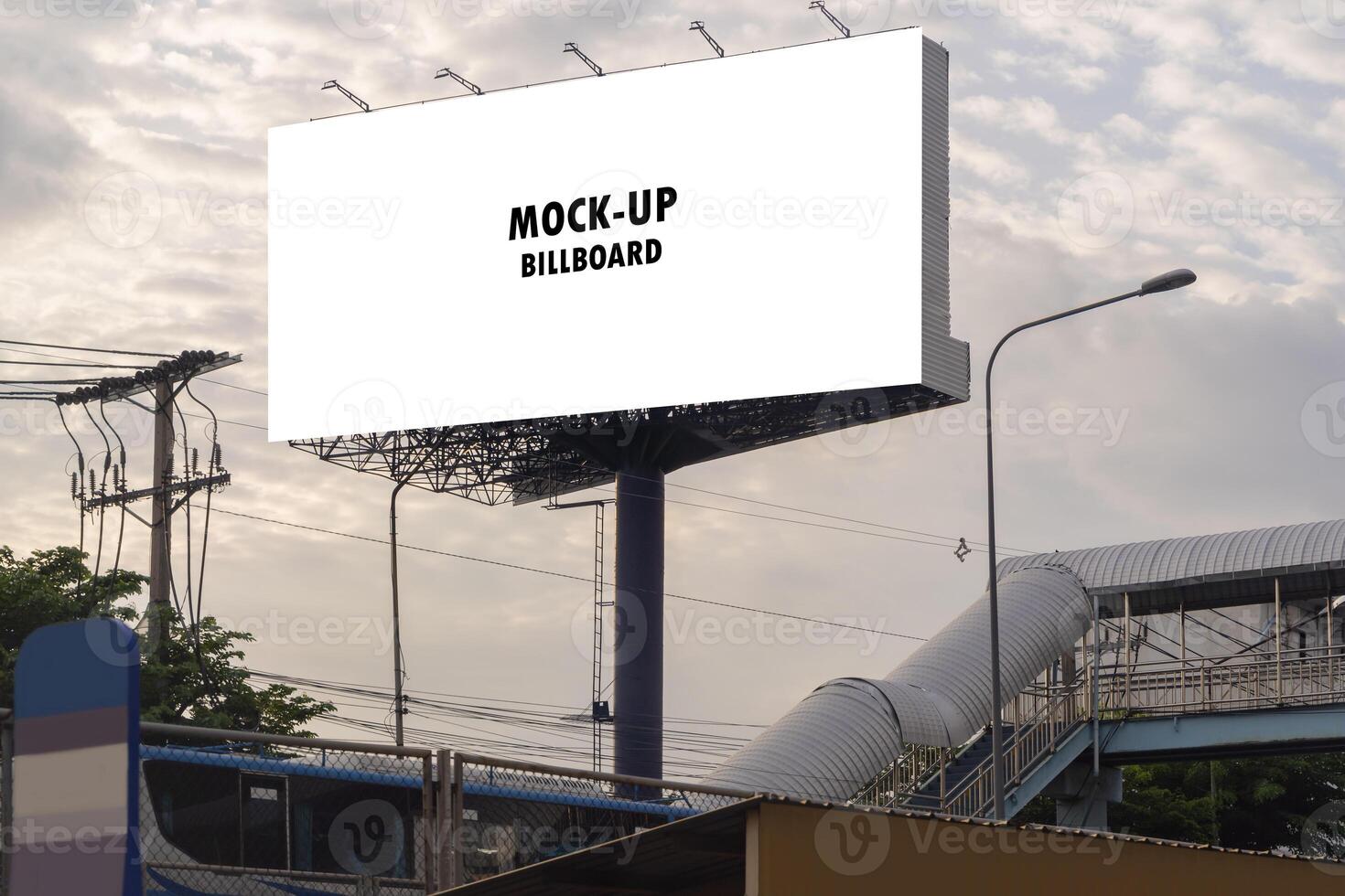 A blank billboard on one of Thailand's streets, a blank billboard with copy space for text or content, mockup of a blank billboard in a big city. photo
