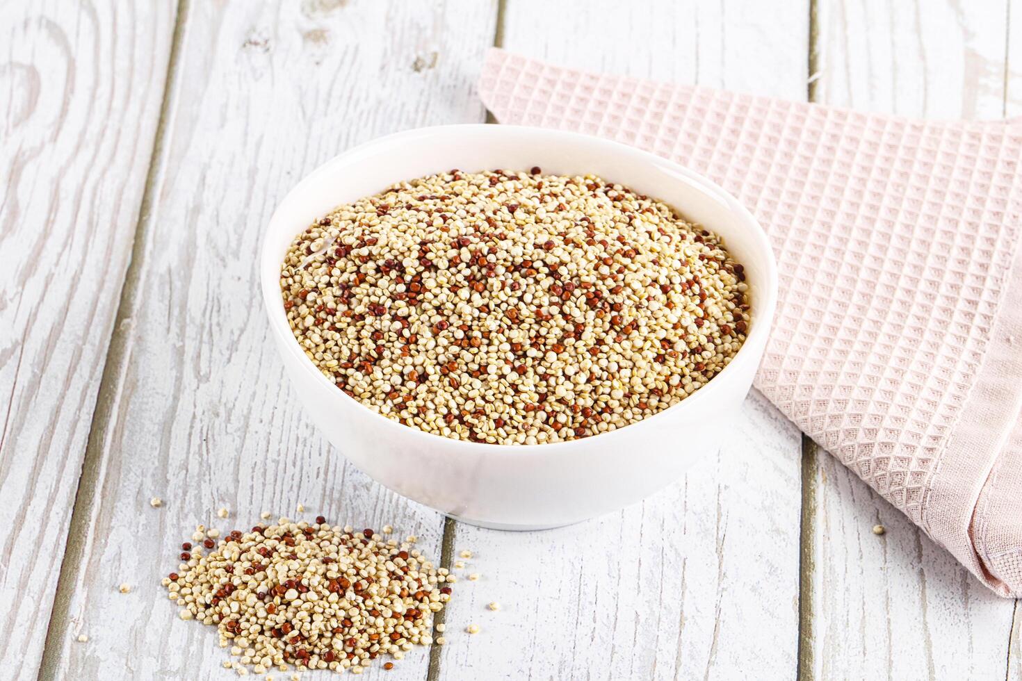 Raw dry quinoa cereal grain photo