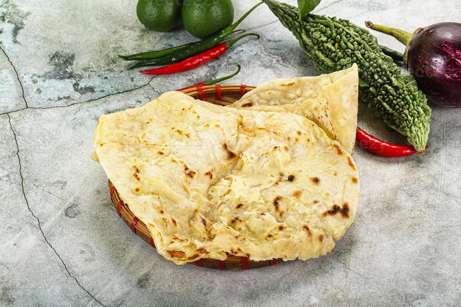 Indian tandori bread - naan with cheese photo