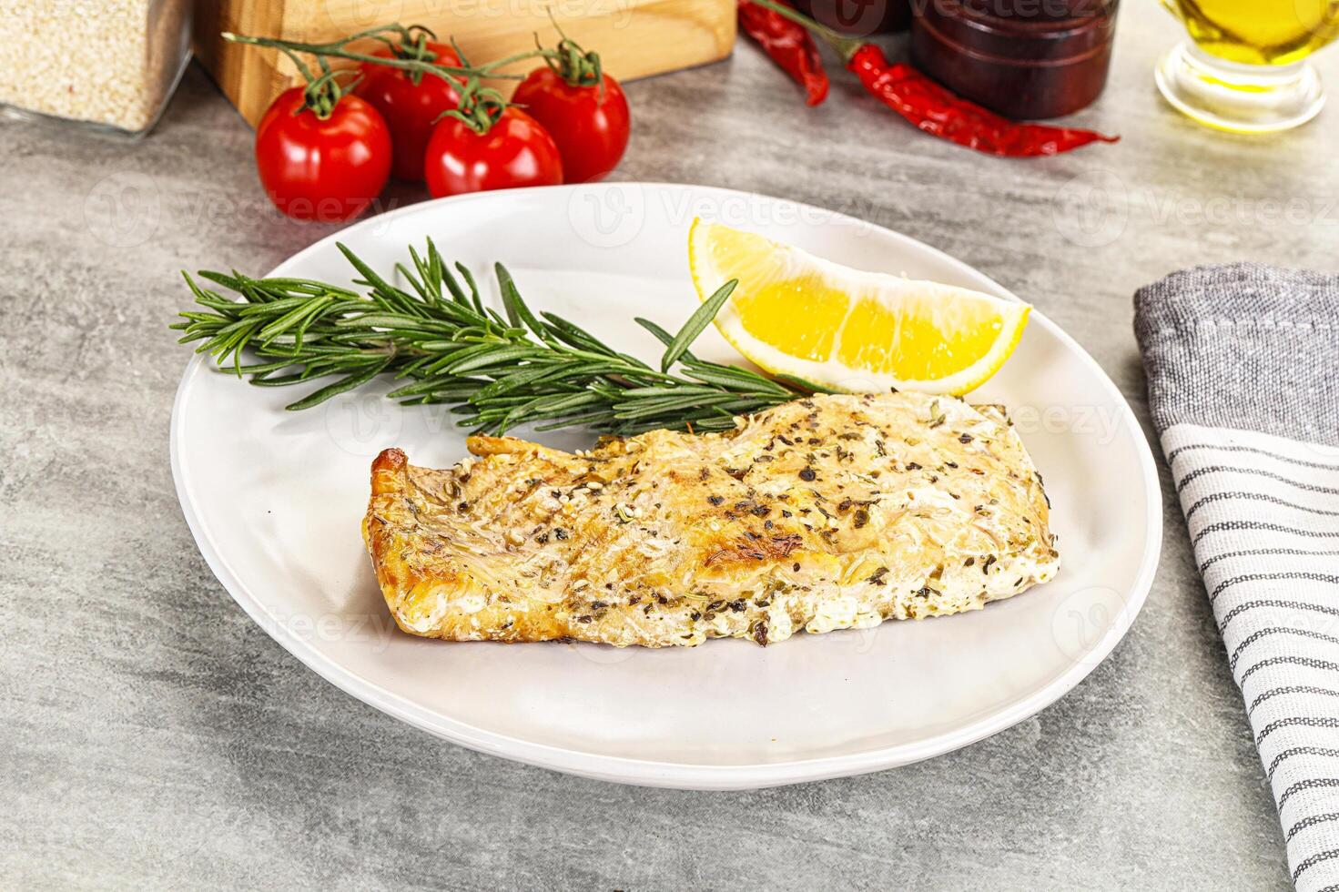 Baked salmon fish served rosemary photo