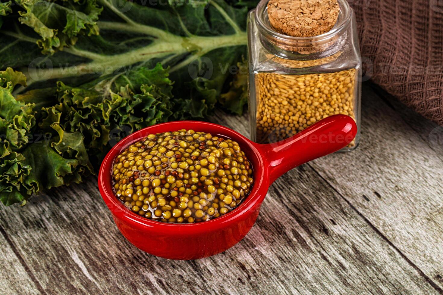 Mustard sauce with seeds in the bowl photo
