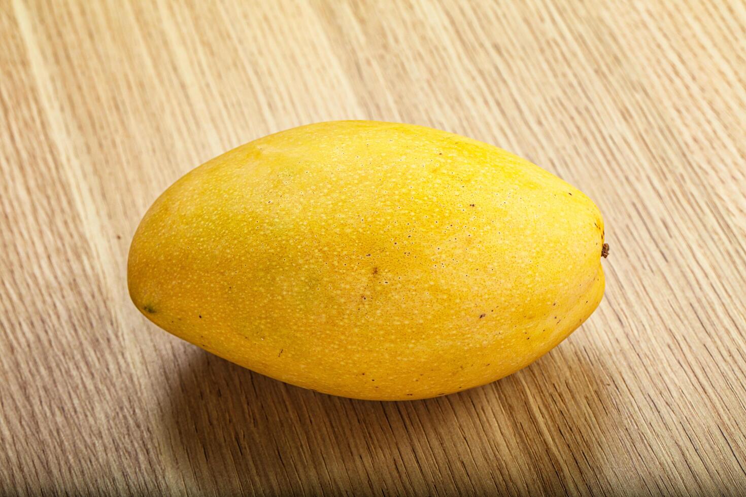 Sweet ripe juicy tropical mango fruit photo