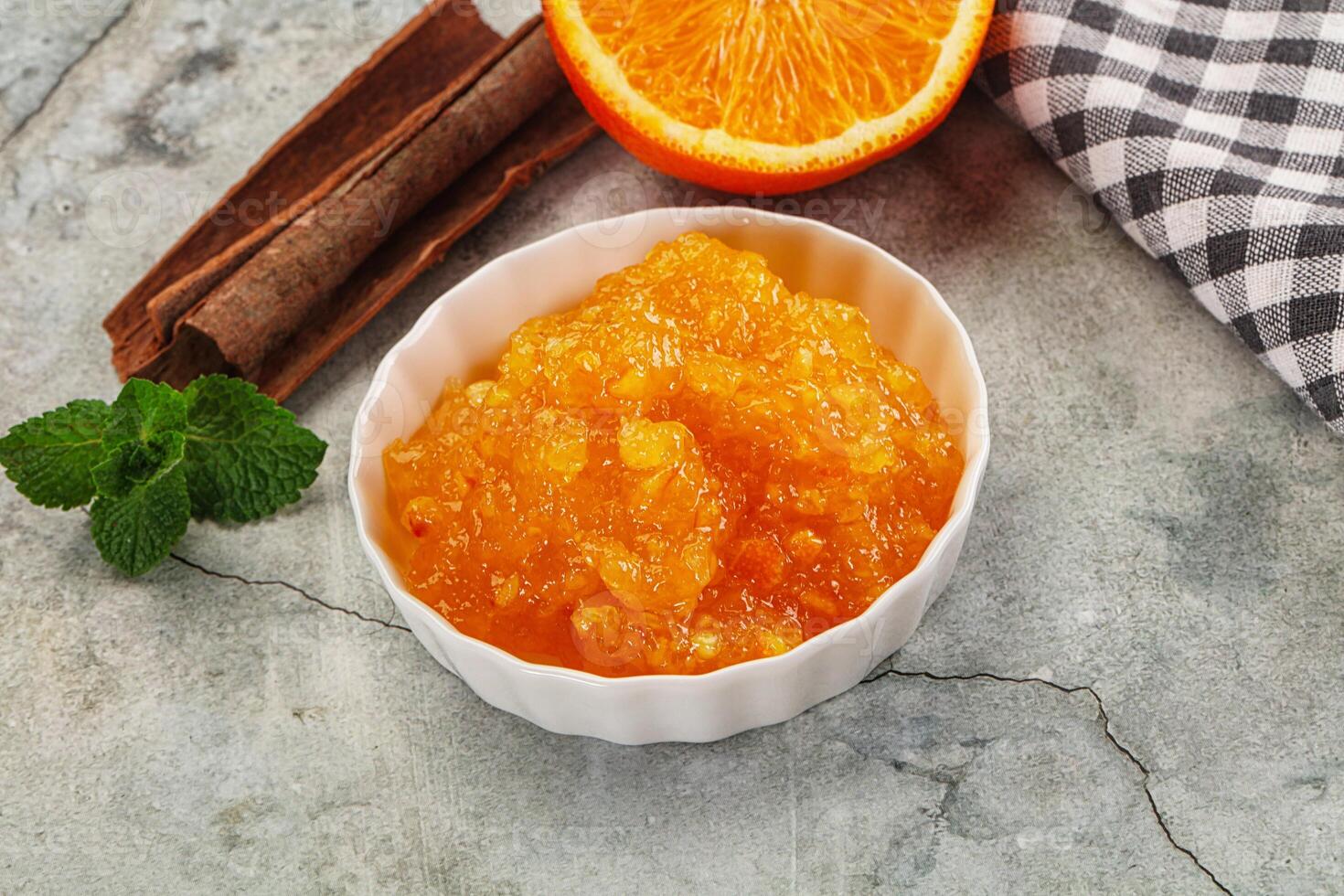 Tasty homemade Orange jam in the bowl photo