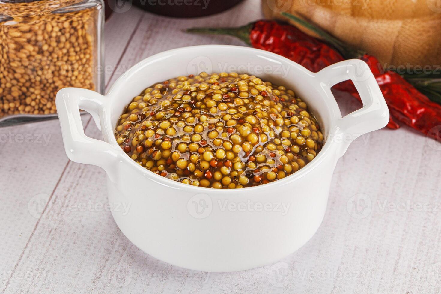 Spicy mustard sauce with seeds photo