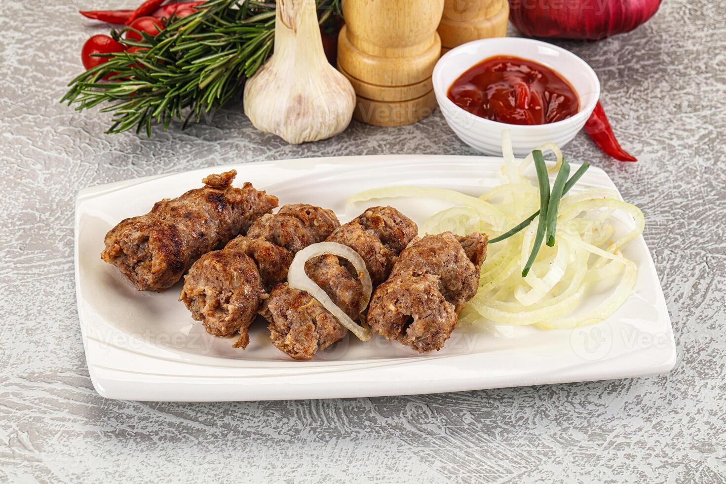 Beef kebab minced meat with onion photo