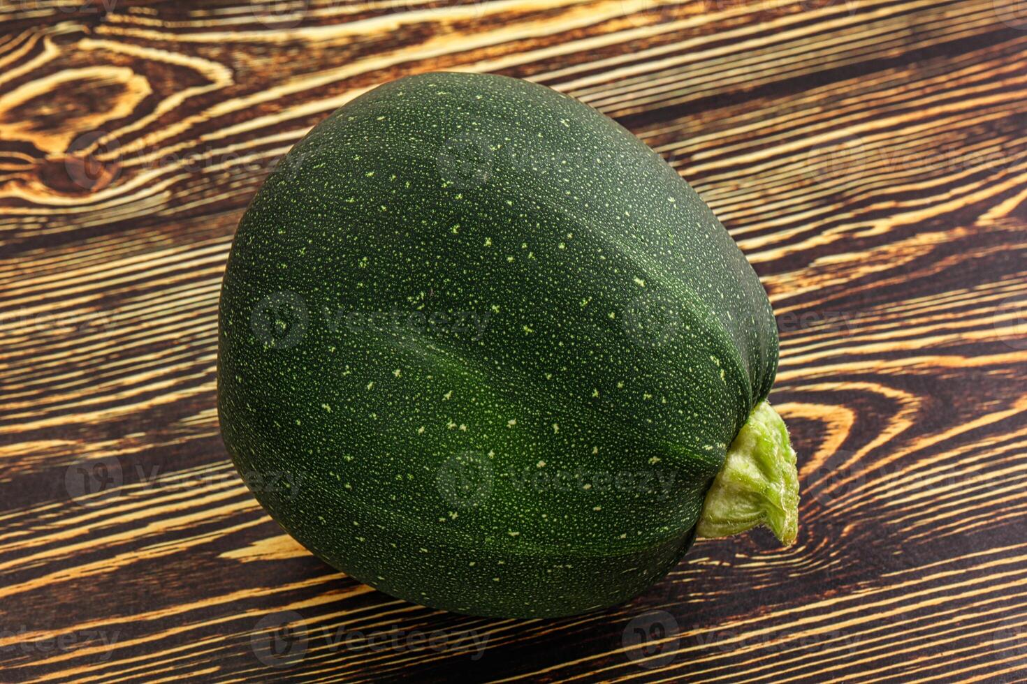 Raw green round zucchini vegetable photo