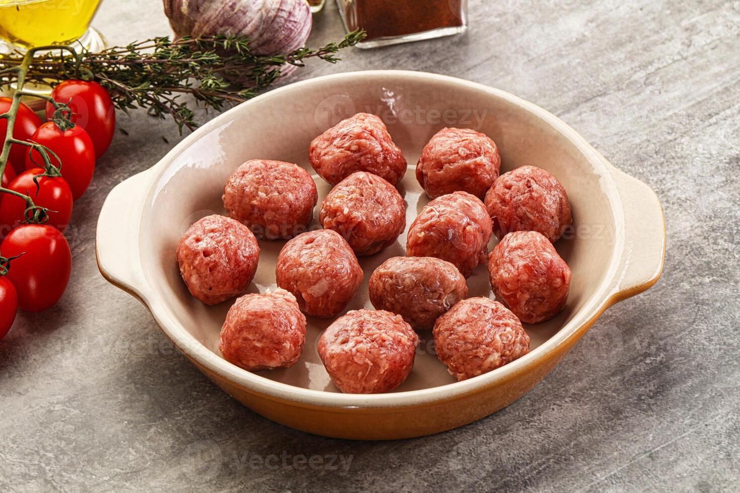 Uncooked raw beef meatball minced photo