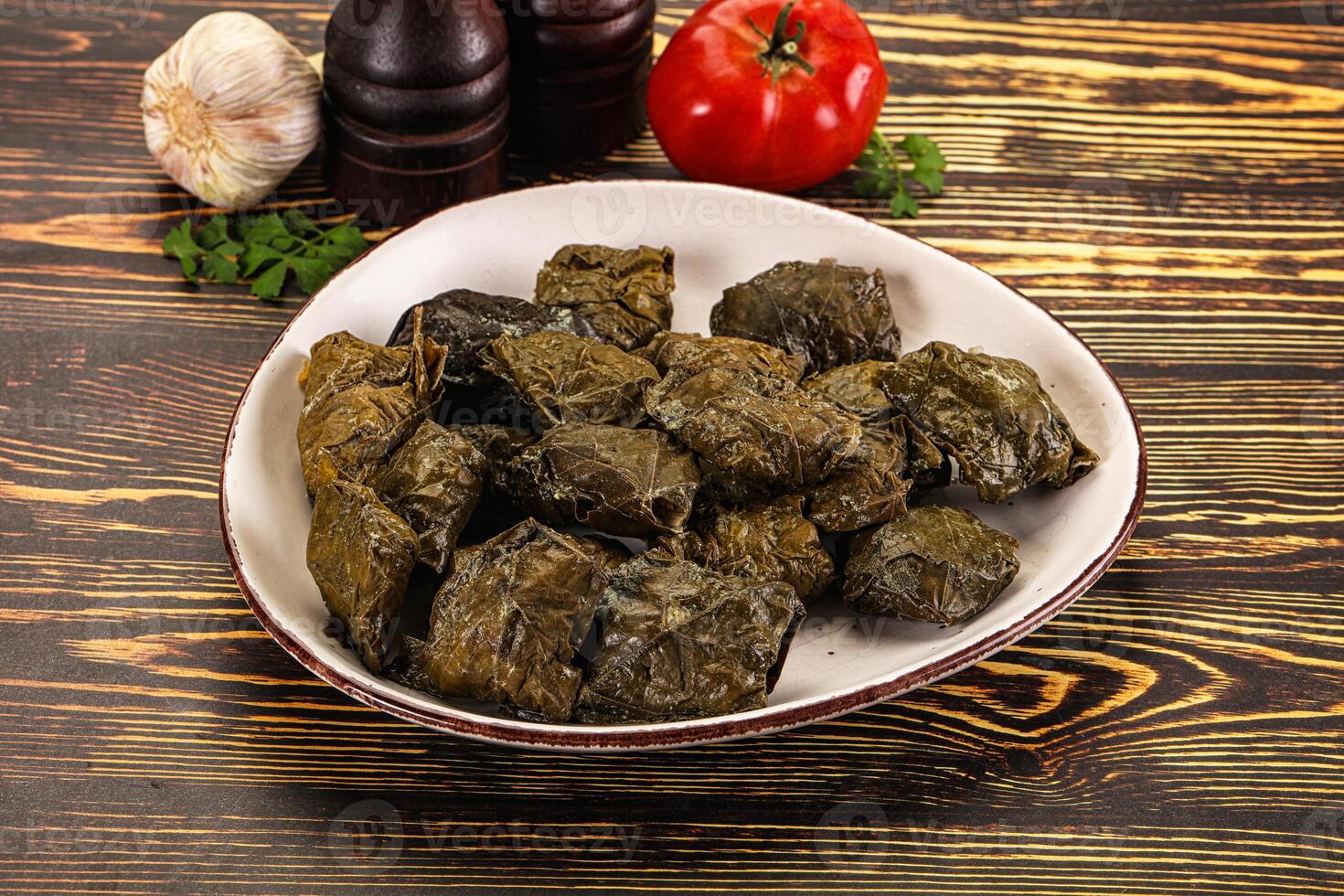 Stuffed dolma - meat in grape leaves photo